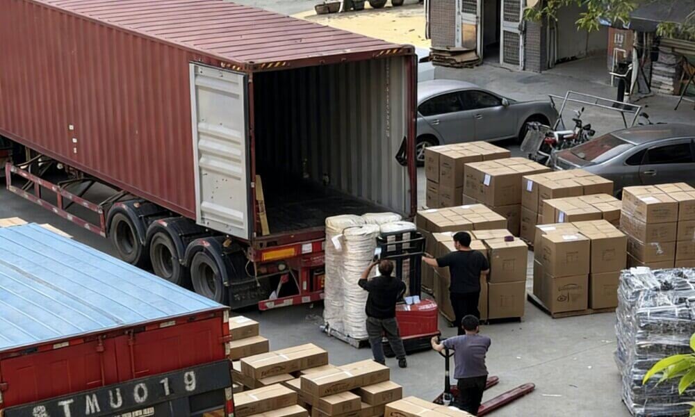 Container shipping being loaded with cargo